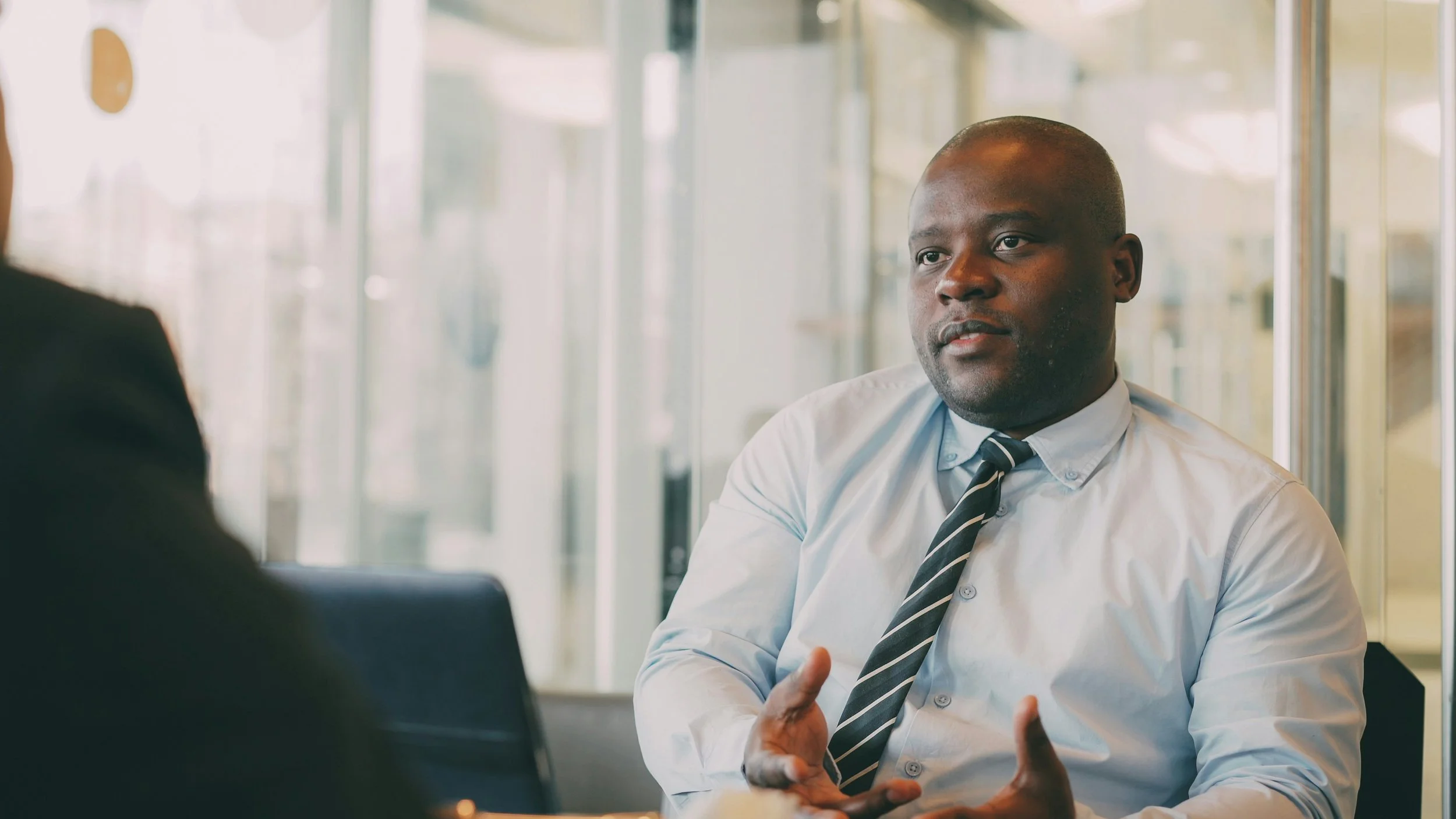 An individual participating in an executive job interview.
