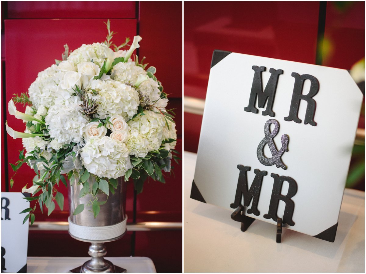 white flowers and custom sign for Malaparte wedding
