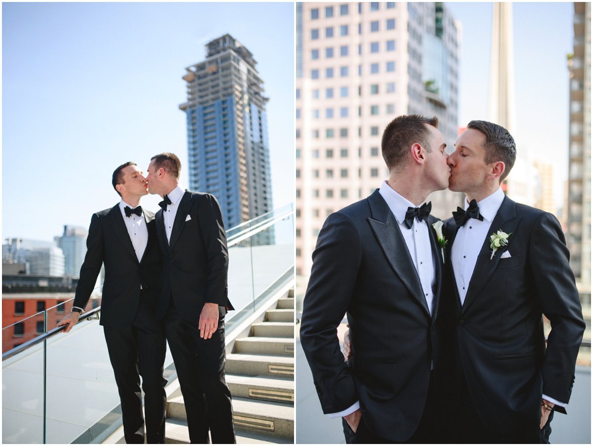 Two grooms in stylish suits with bow ties in downtown Toronto wedding at Malaparte