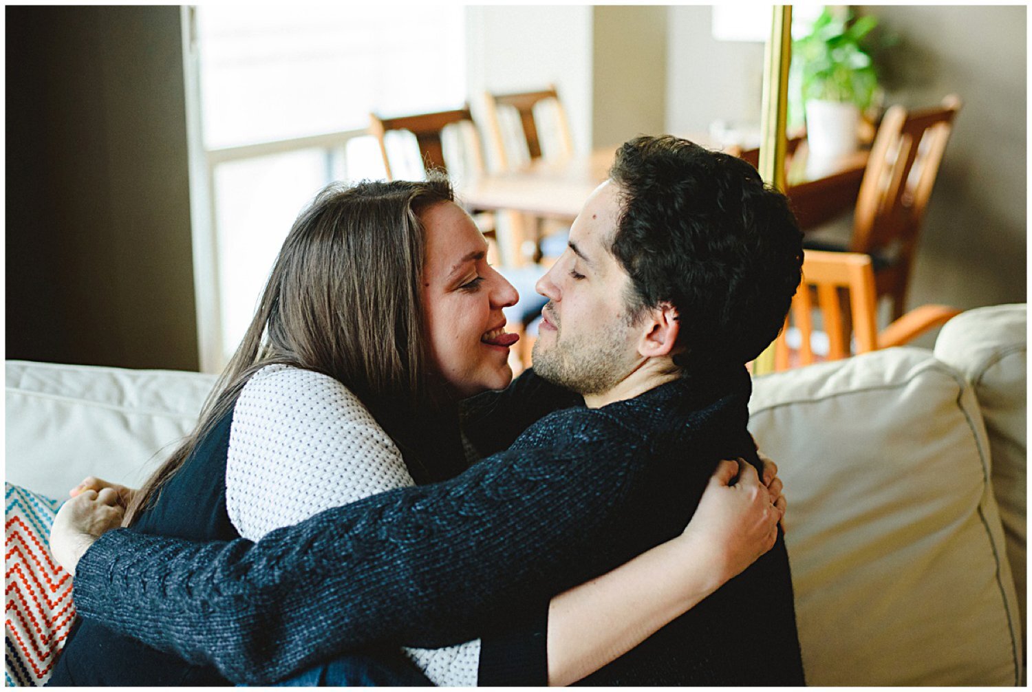 couple goofing off at Toronto at home engagement session