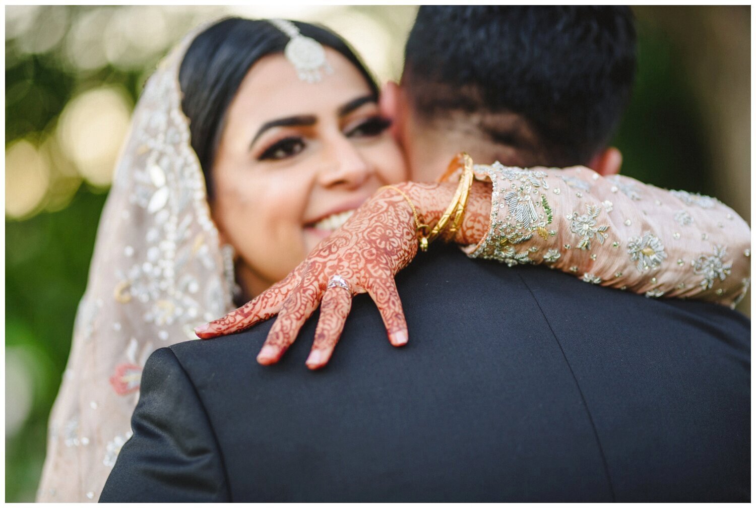 bride and groom embracing at muslim wedding at Dundas Valley golf club 