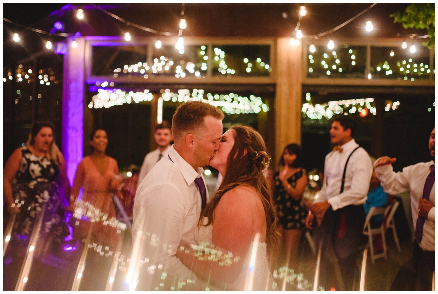 string lights and Edison bulbs at Kortright Centre Wedding 