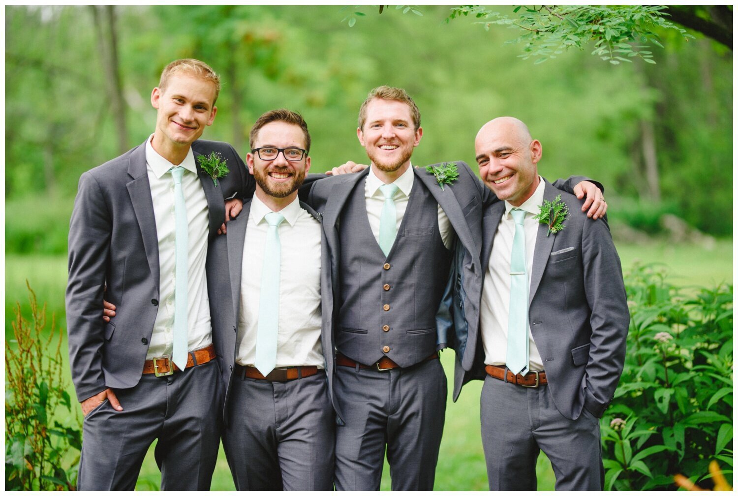 groom with his groomsmen at backyard tent wedding in Claremont Ontario