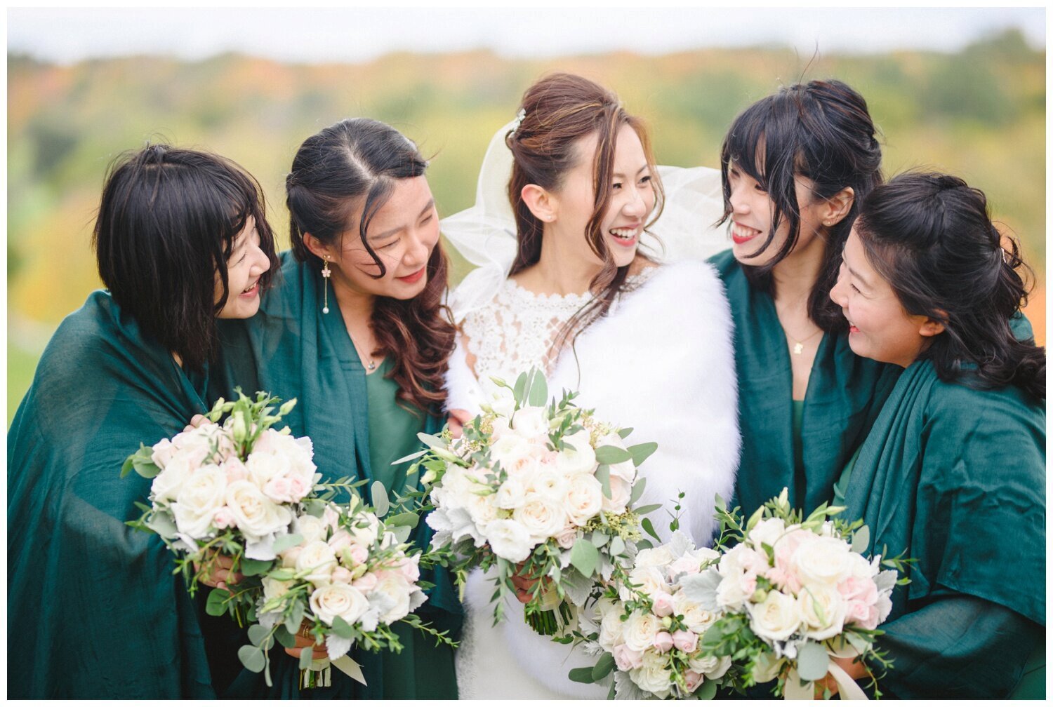 bridesmaids wearing dark emerald green at Credit Valley Golf Club Wedding