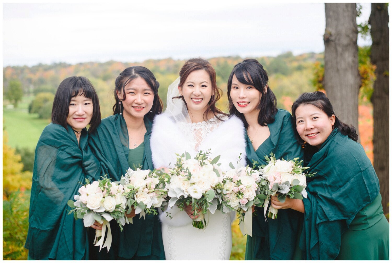 bridesmaids wearing dark emerald green at at Credit Valley Golf Club Wedding