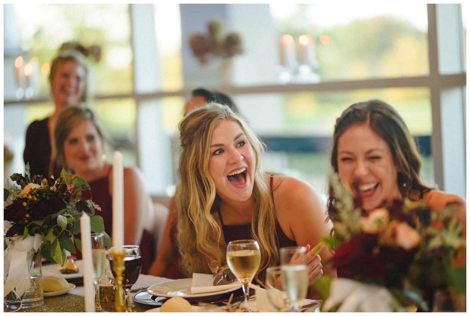 bridal party laughing during speeches at The Greens at Renton Wedding