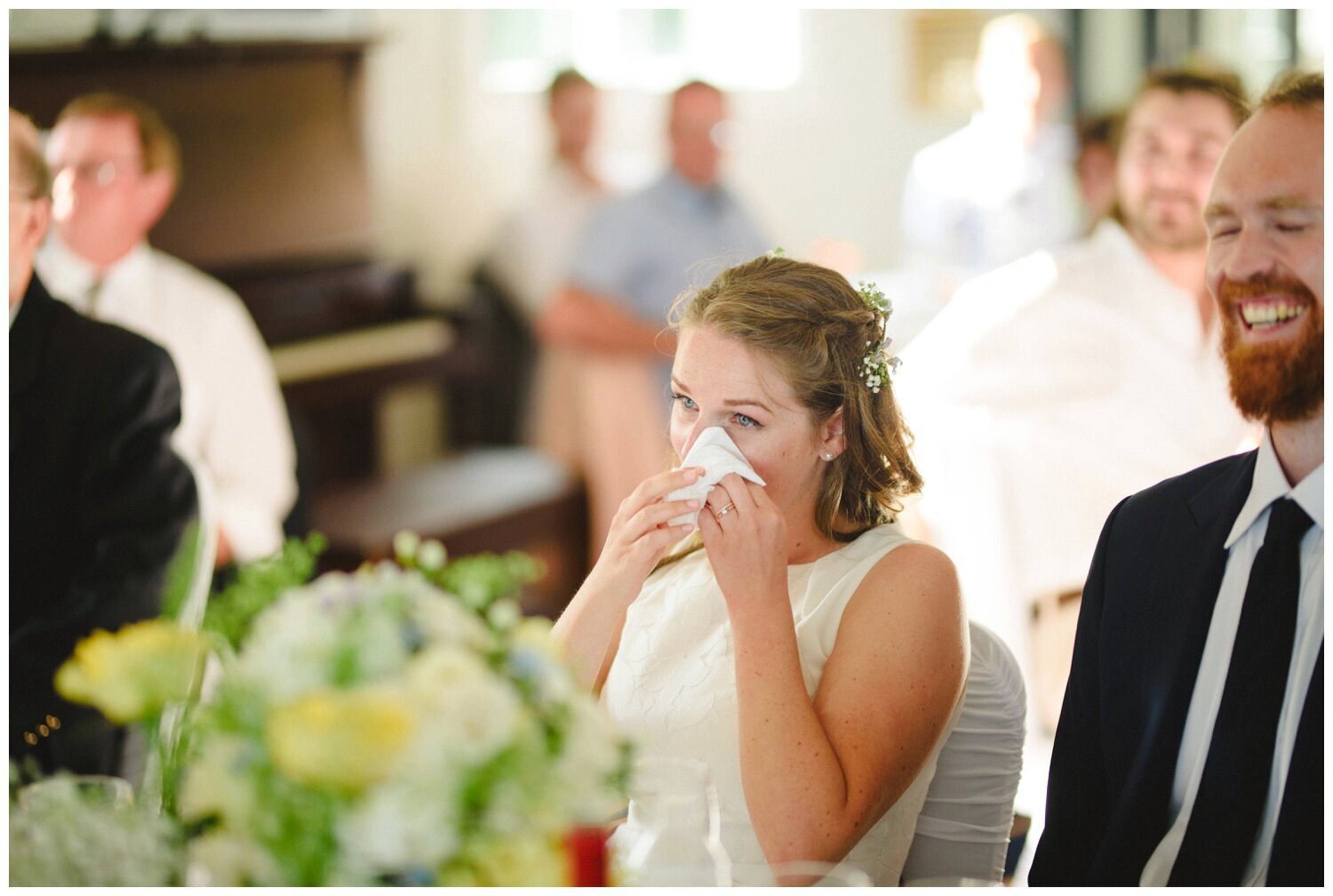 bride crying during the speeches at intimate wedding at Barrie Yacht Club