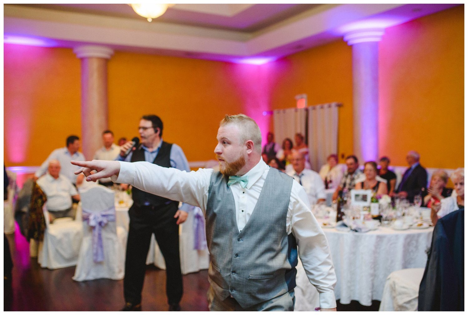 groom throwing the garter at Tosca Banquet Hall Wedding in Oshawa