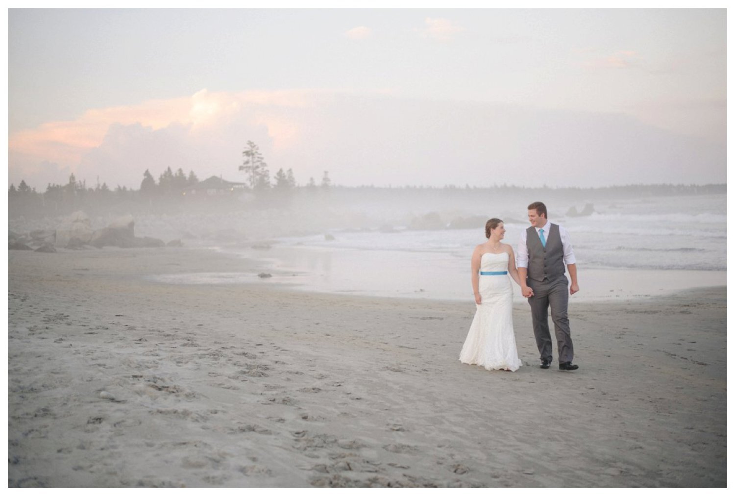 couple on the beach at Whitepoint Beach Resort Nova Scotia Wedding