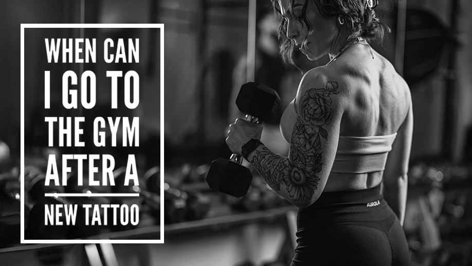 A woman with tattoos lifting dumbbells in a gym with a motivational quote about going to the gym after getting a new tattoo.