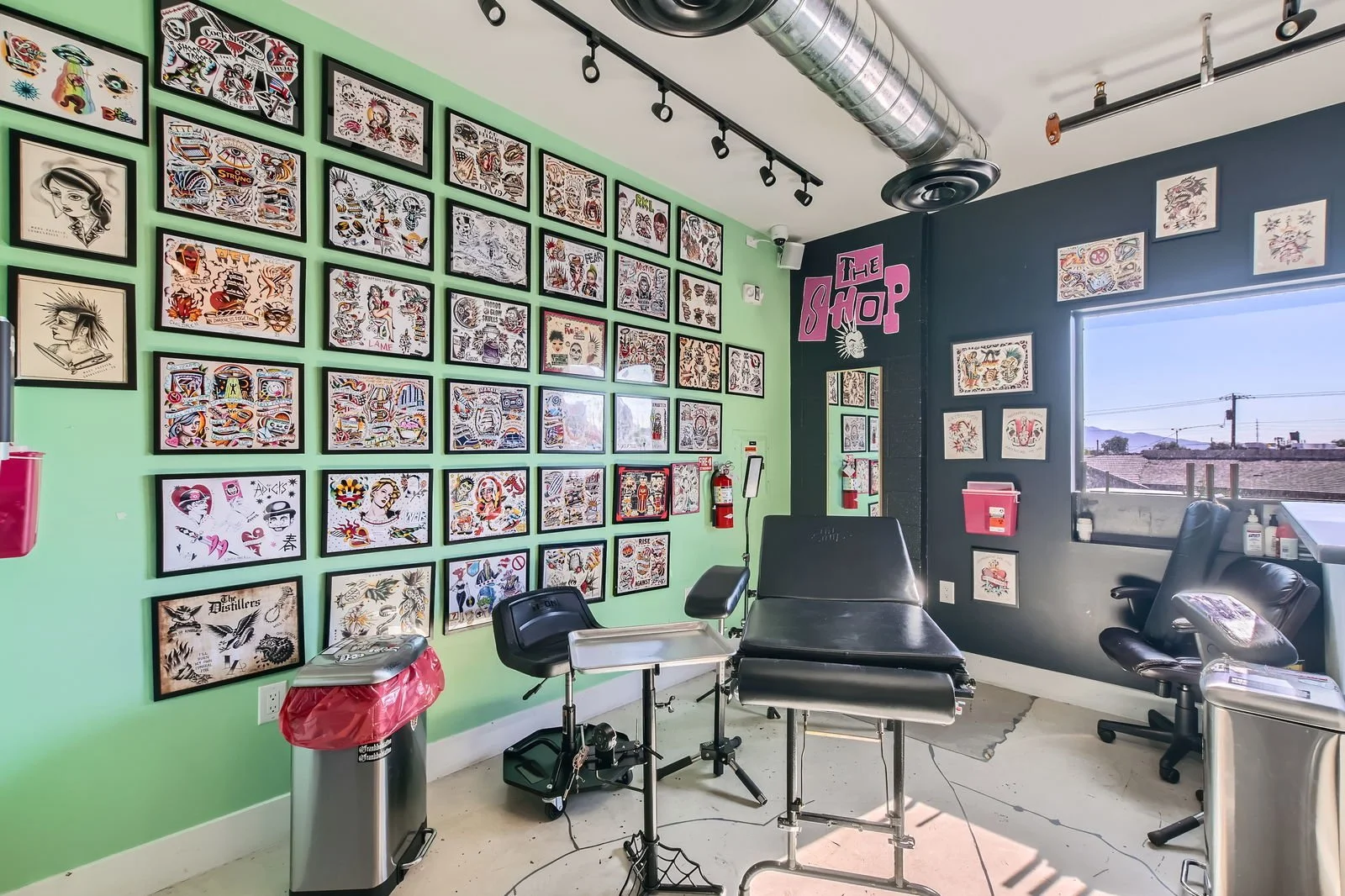 Las Vegas tattoo shop inside The Punk Rock Museum featuring punk flash art, where couples can visit the Las Vegas wedding chapel and get tattooed.