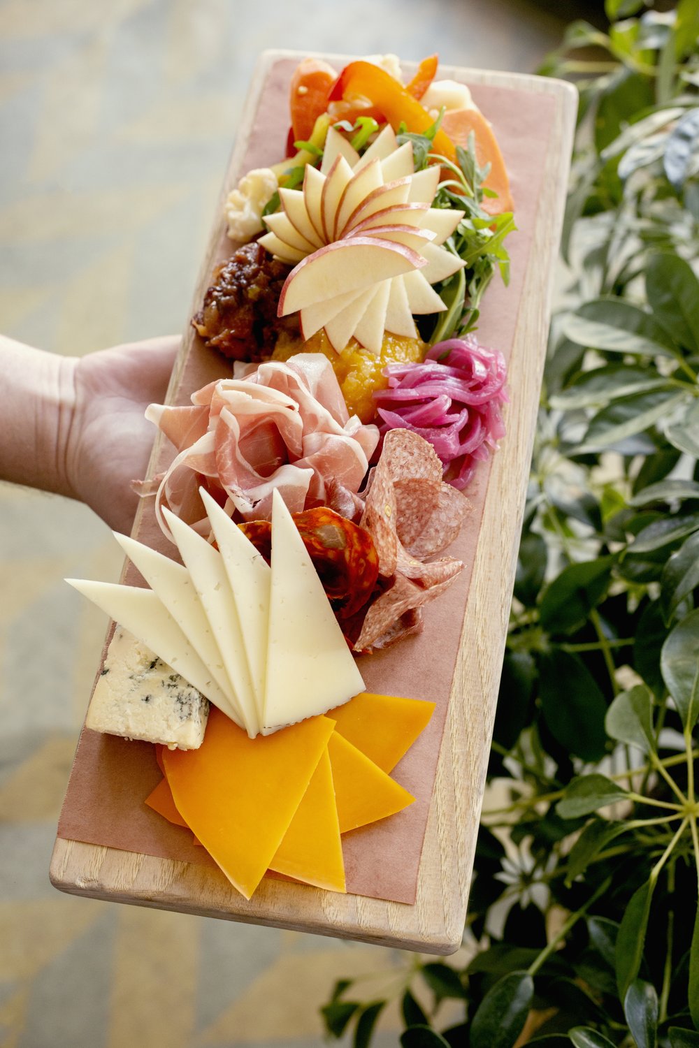 A meat and cheese board at Txikiteo