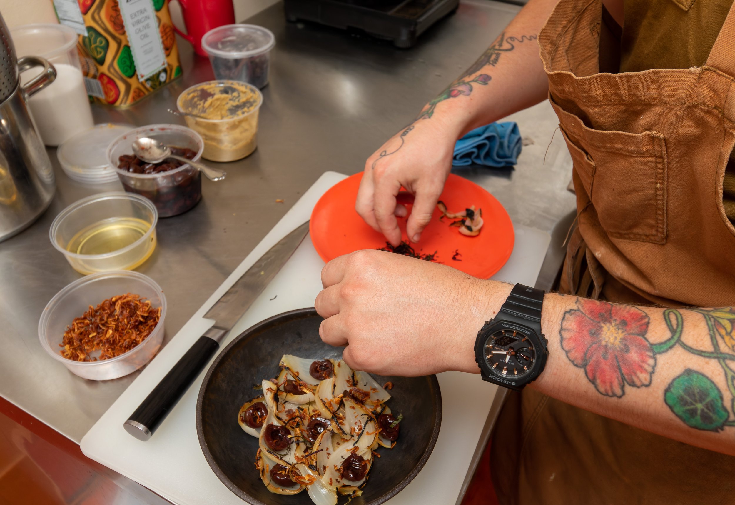 Pecoraro prepares a dish.