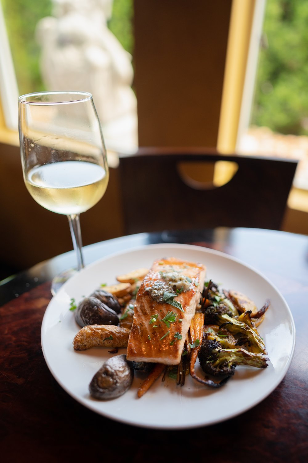 A Cafe Tuscano salmon dish made with Bowman Farm produce.