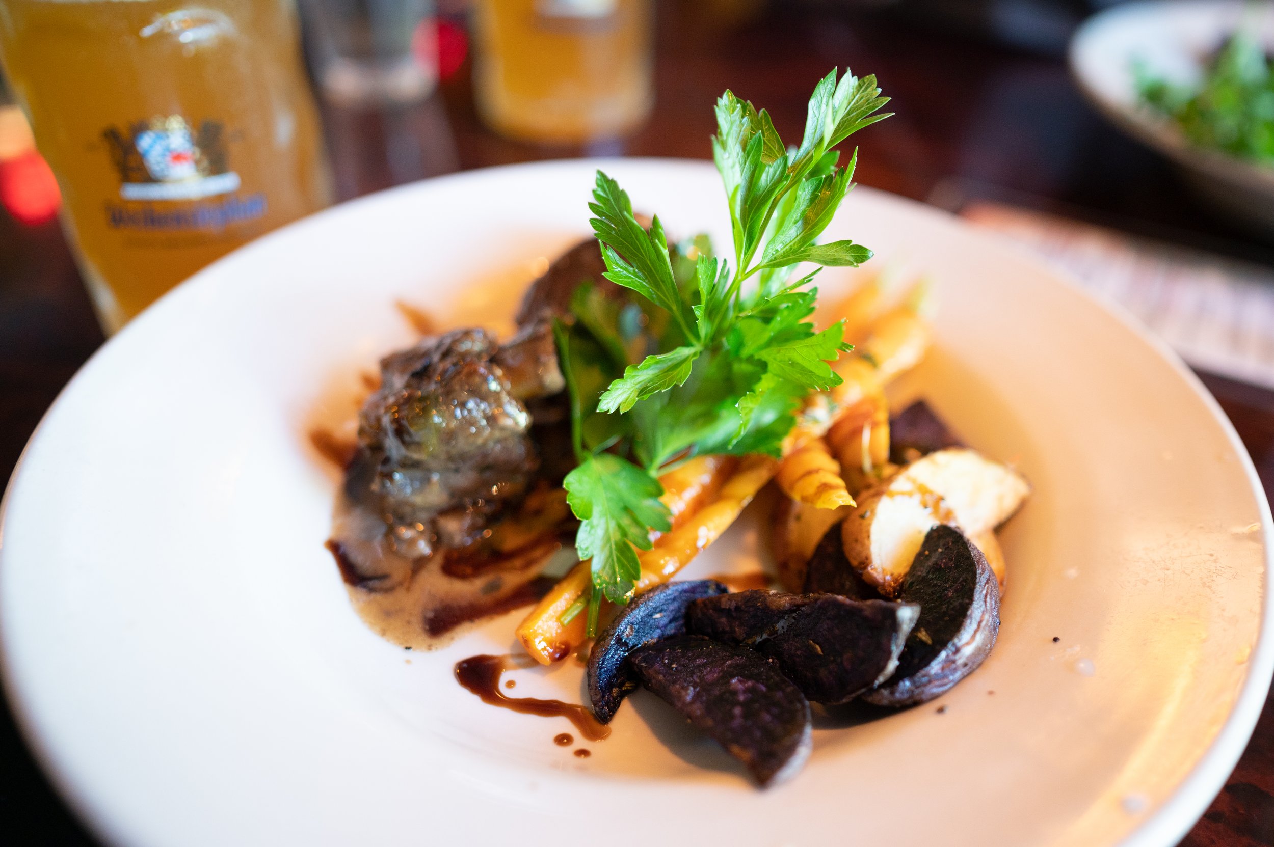 Braised short ribs with Bowman Farm root vegetables and parsley prepared by Spence and Lenon