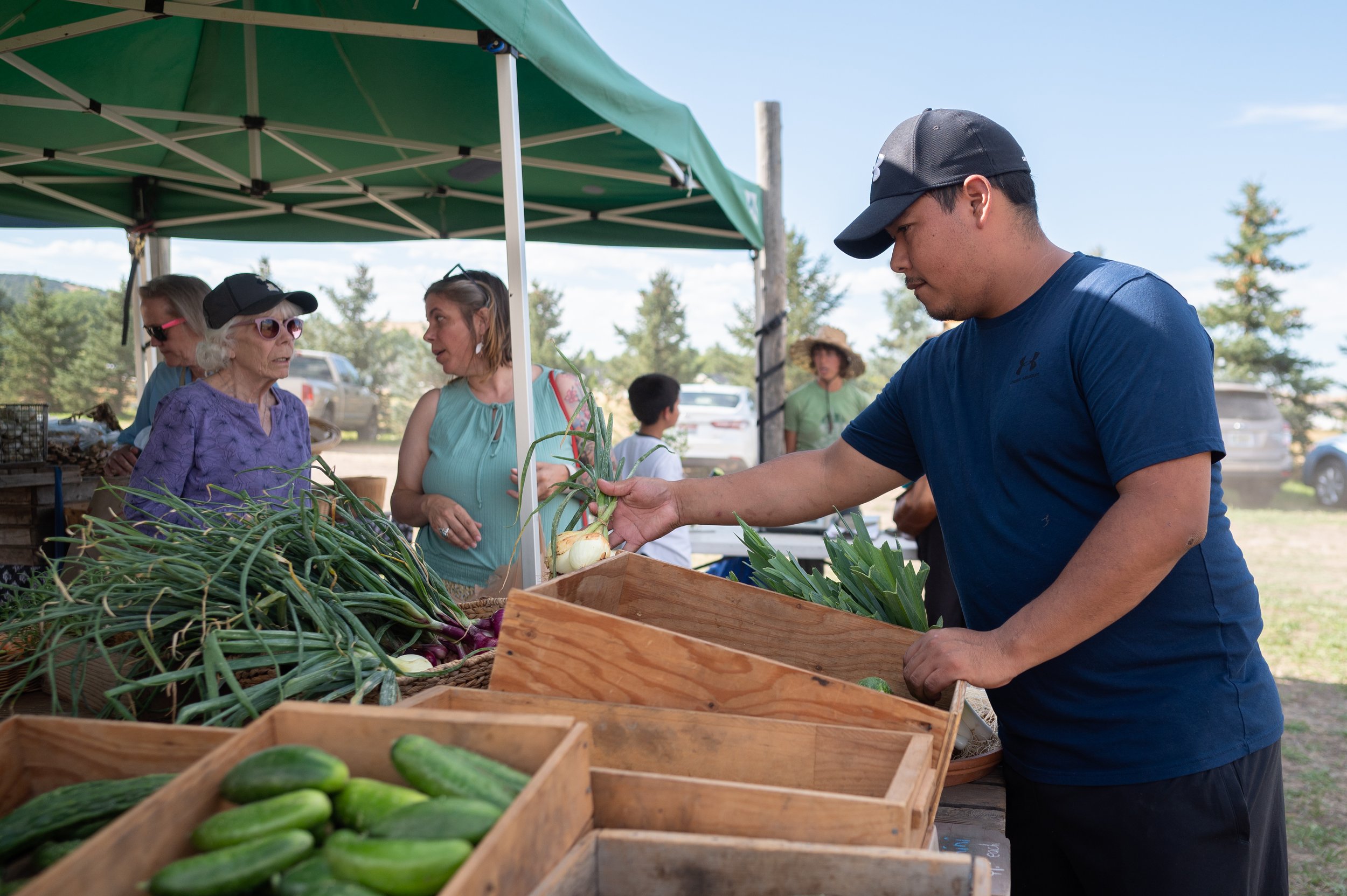 Spence shops at the market.