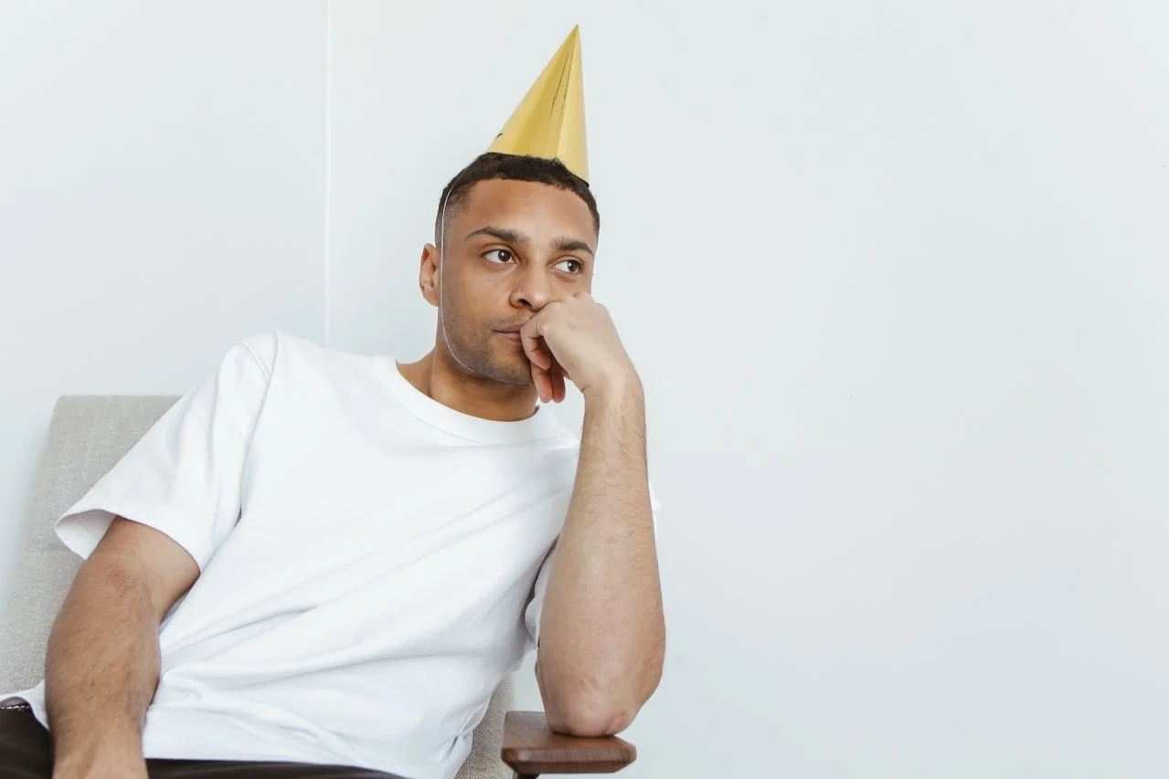 a-man-wearing-a-party-hat