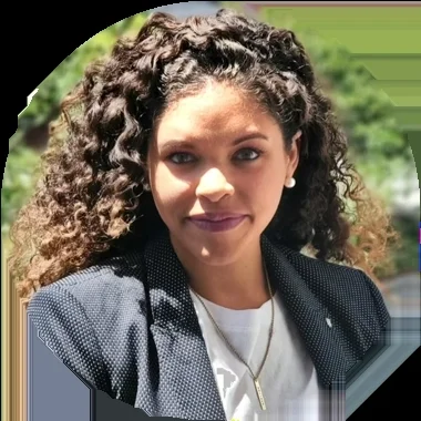 A headshot of Katie Pitts, smiling.