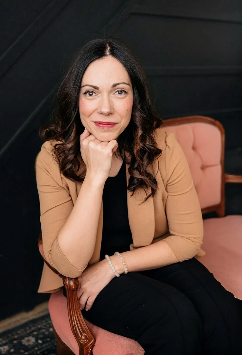 A headshot of Georgiana Avram, smiling.