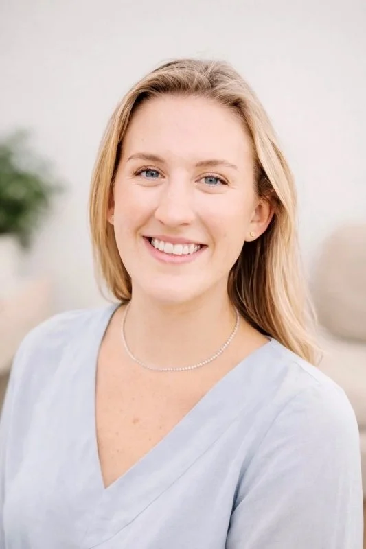 A headshot of Anna Zippelli, smiling.
