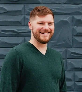 A headshot of Matt Mazick, smiling.