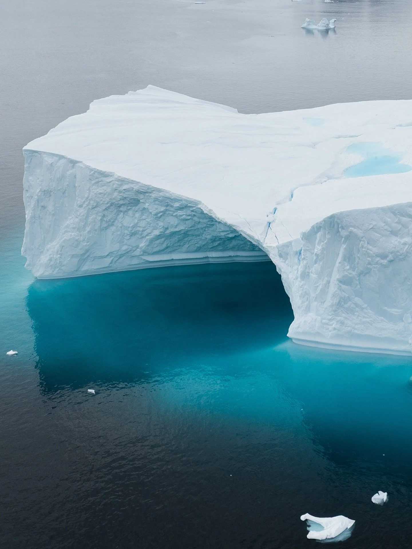 In the land of these giants, I&rsquo;m constantly drawn to the textures and colours of Icebergs. The wind scarred faces of these icebergs with their lines and layers constantly eroded by Antarctic conditions. And below the surface, the blue deepens i