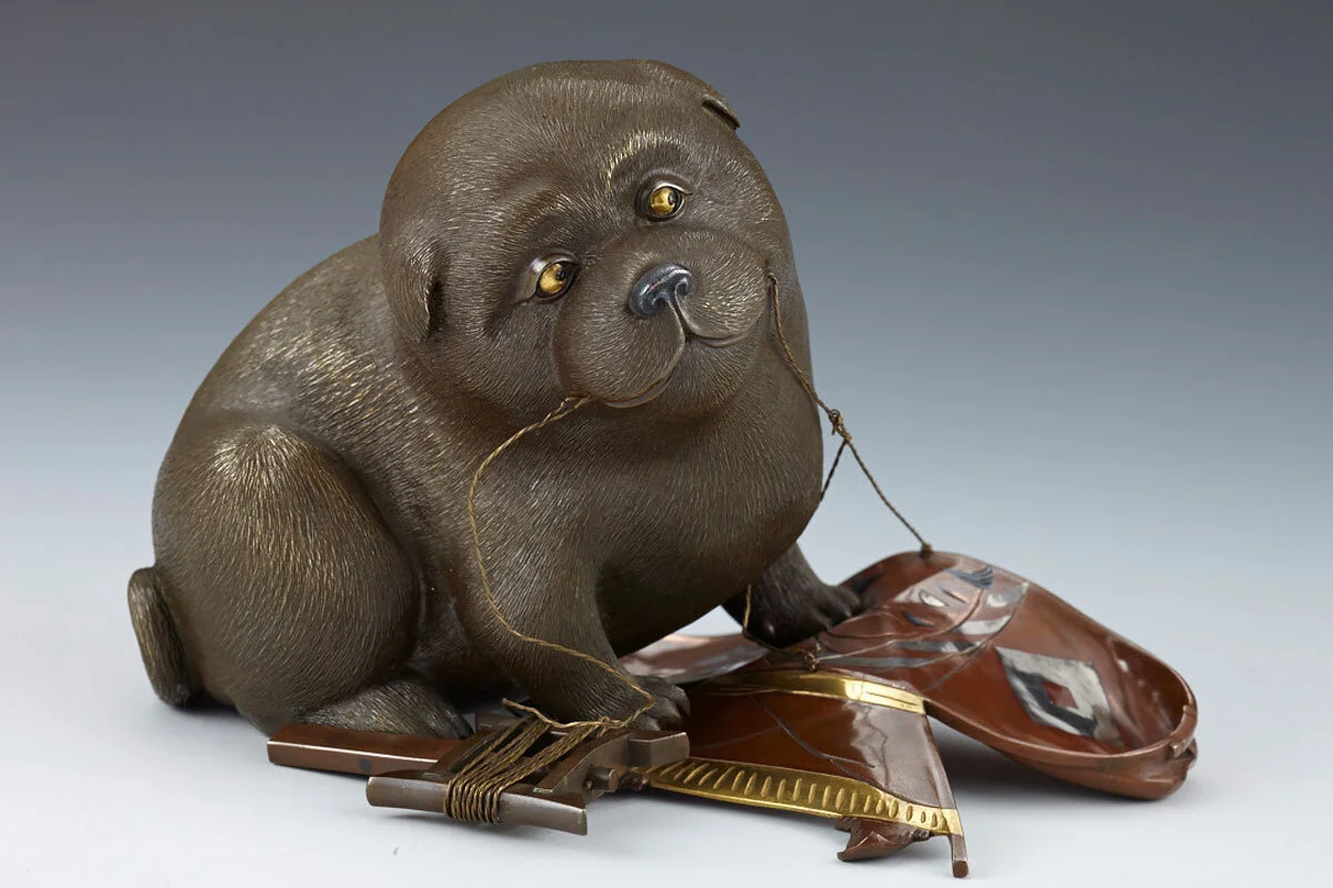 Kitagawa Hokusen, Inlaid Bronze Okimono of a Puppy Playing