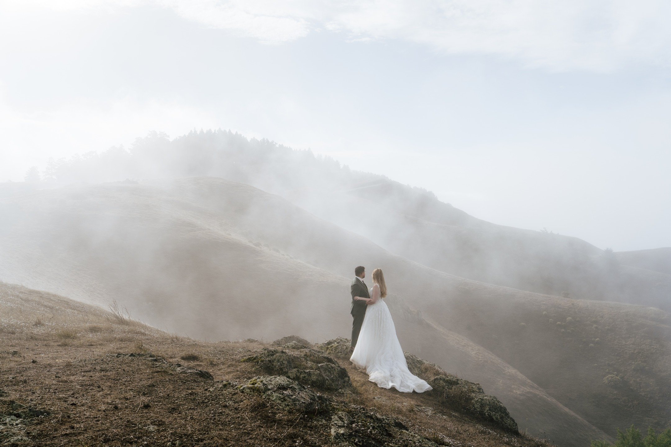sunrise scenes from the first two hours of J &amp; G's all-day bay area elopement, with Karl the Fog making a magical appearance ☁️

this day was an epic one that started above the clouds and ended in the ocean. from mountaintops to the forest floor 