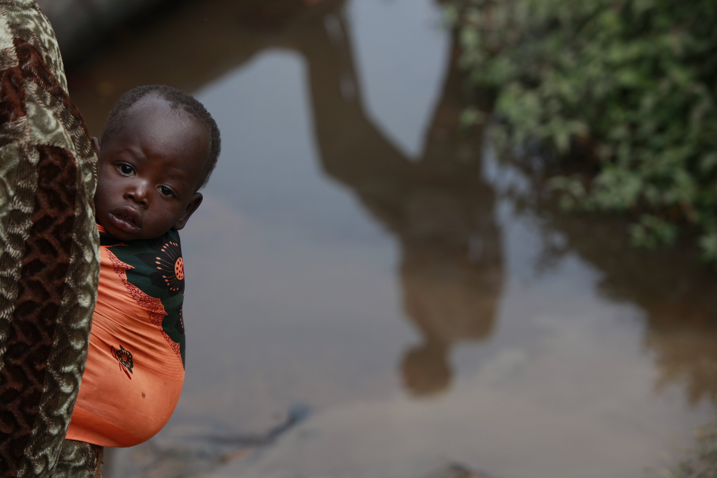  A mother carries her baby in the Democratic Republic of Congo.  