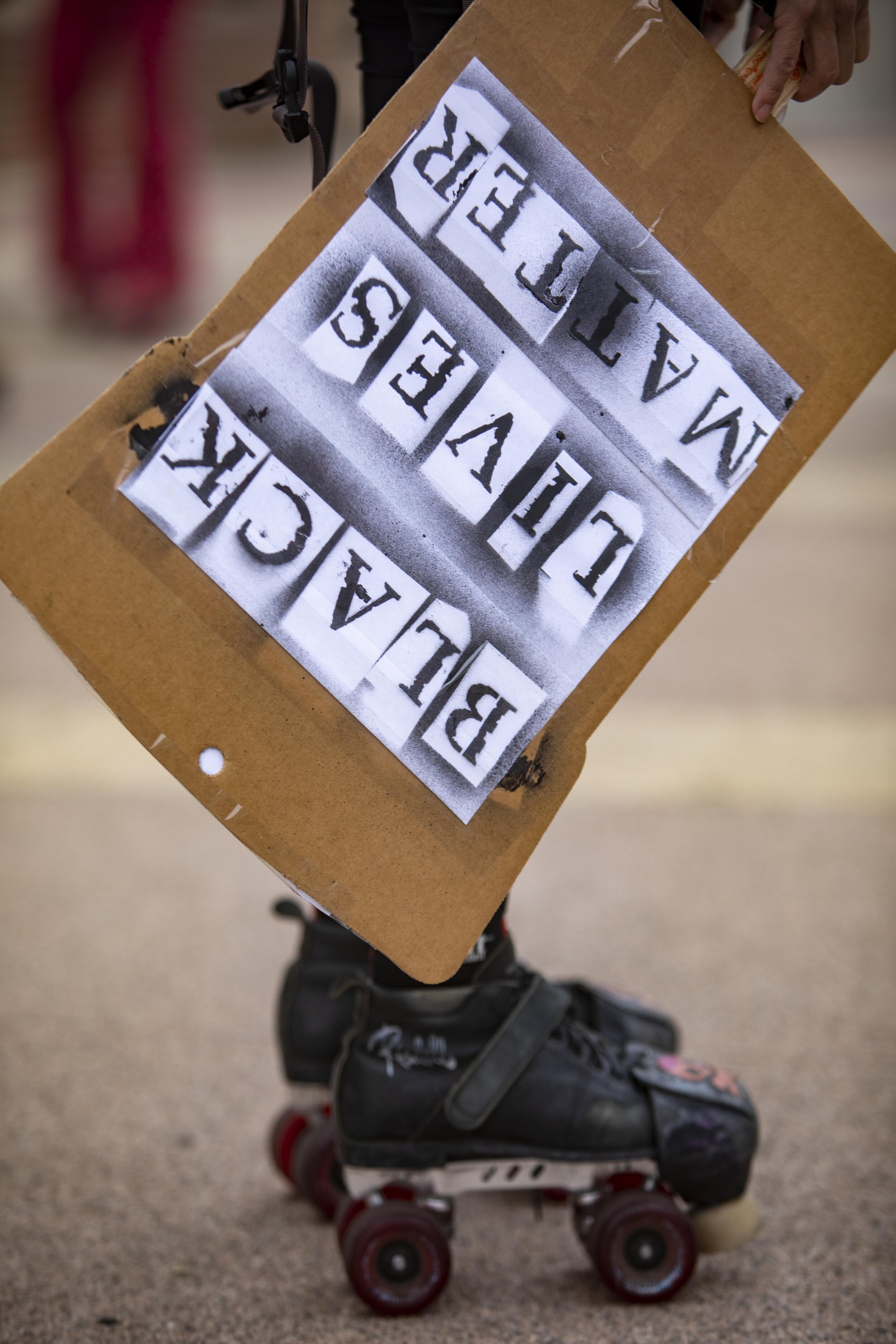  A roller skater holds a Black Lives Matter sign at the Rise &amp; Skate  all wheels welcome protest in celebration of Juneteenth and in solidarity with Black Lives Matter in Los Angeles.  