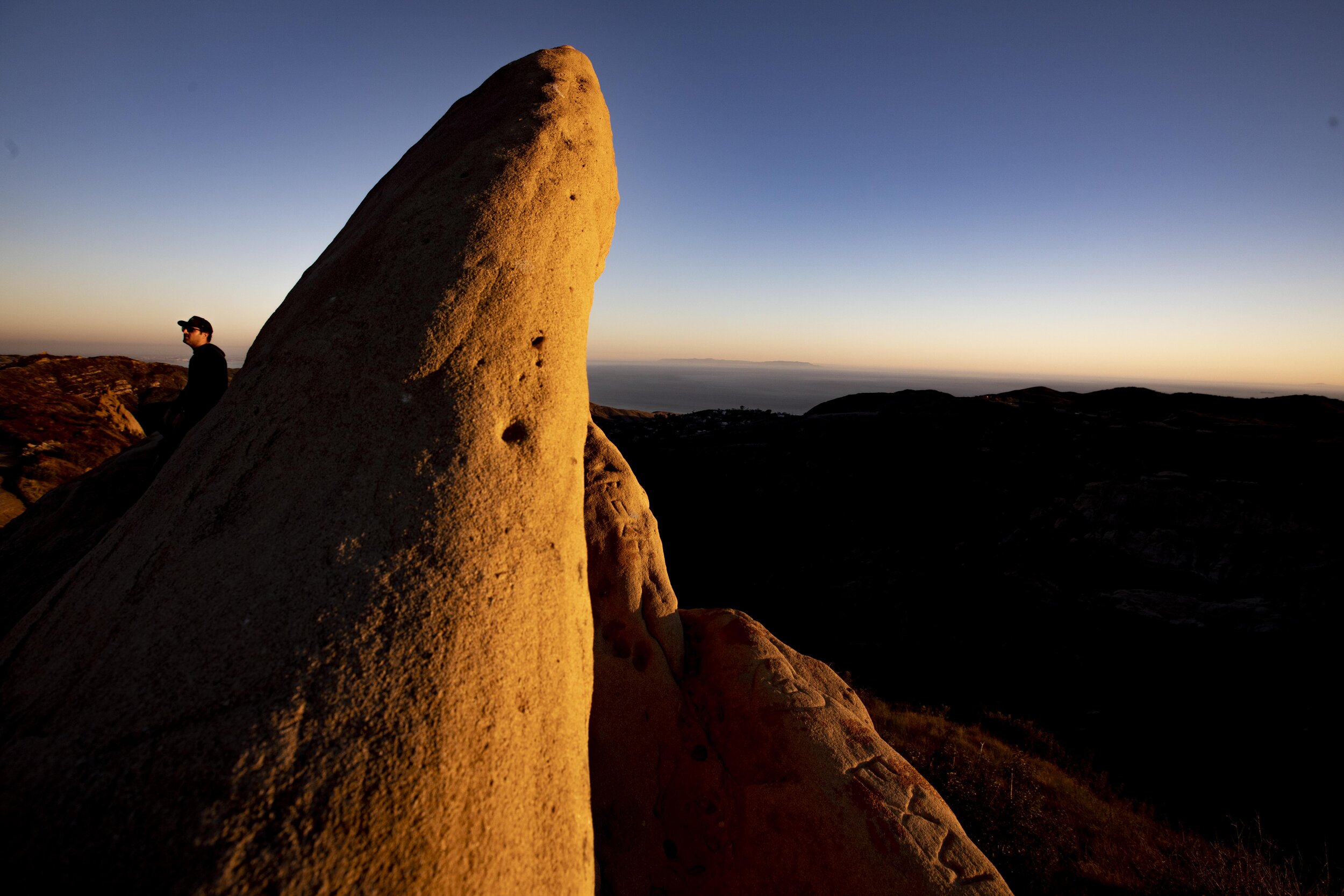  Mo Satarzadeh takes in the sweeping ocean views on the Backbone Trail through Corral Canyon at sunset in Malibu.  