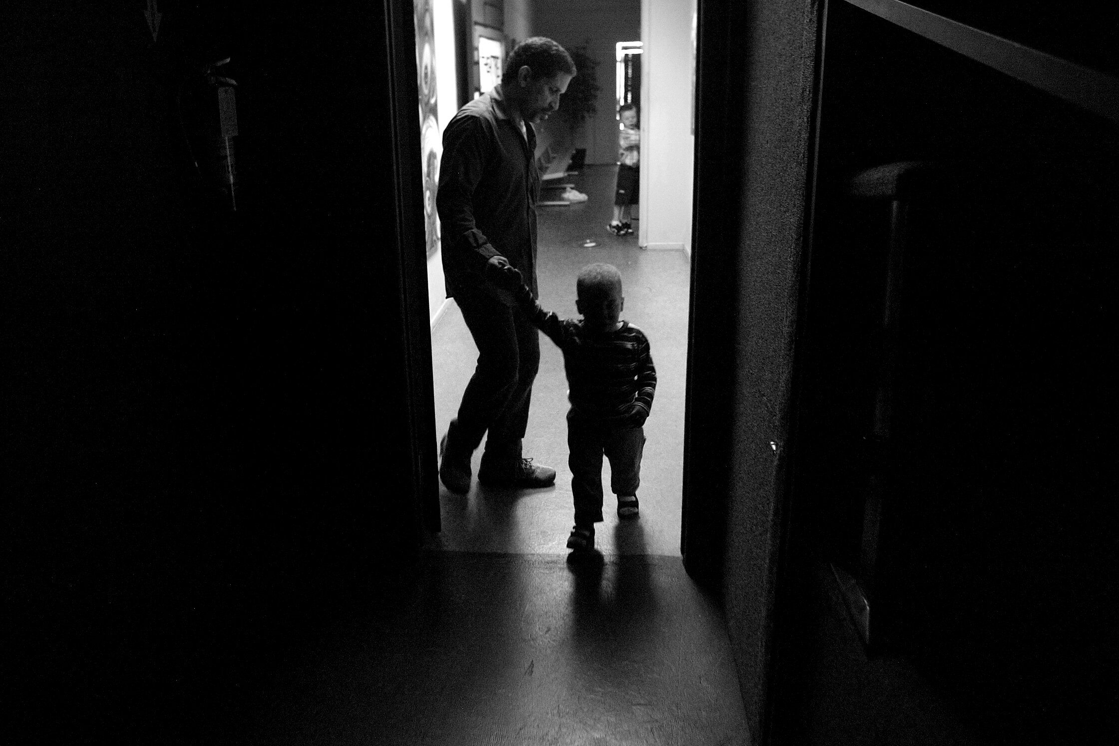  Joe Alway  and his son Manny at the location of the theater where Joe holds church services.  