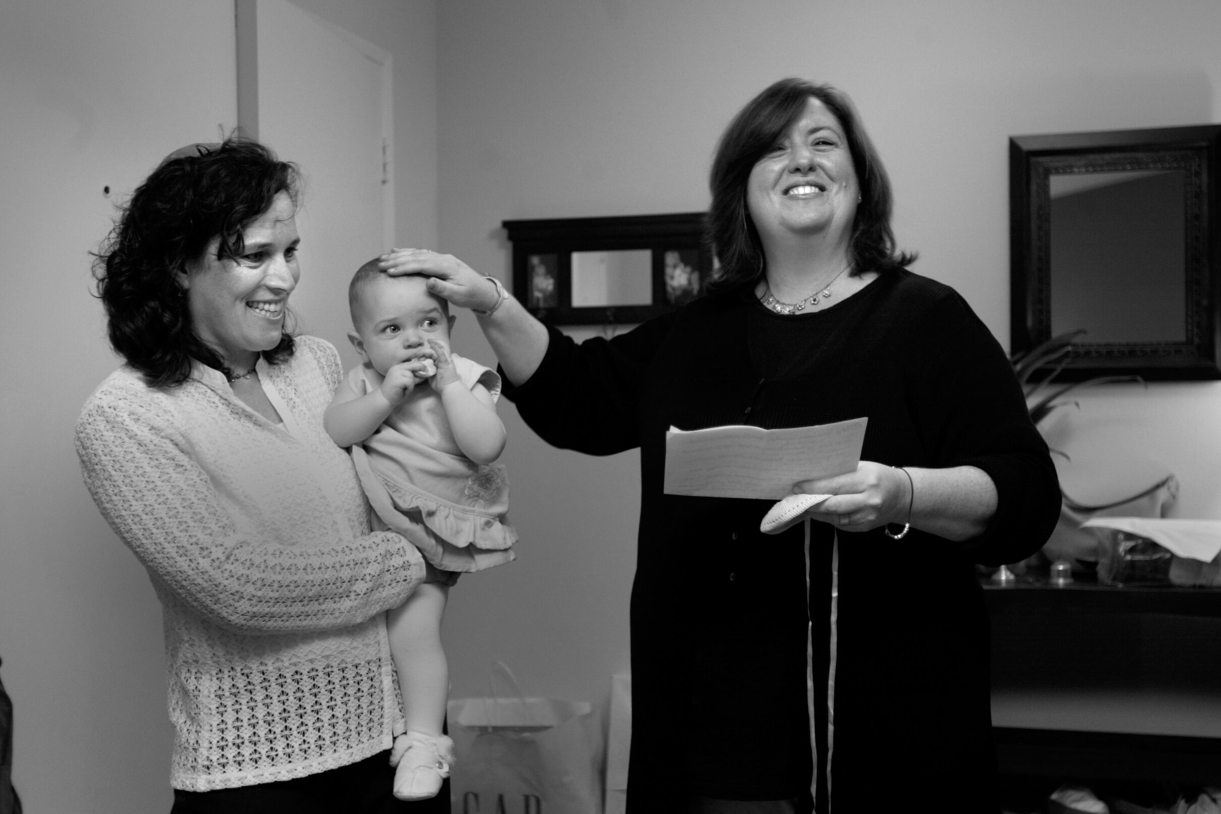  Rabbi Karen Bender and her wife Rachel Bernstein at the naming  ceremony of their daughter Shoshie.  