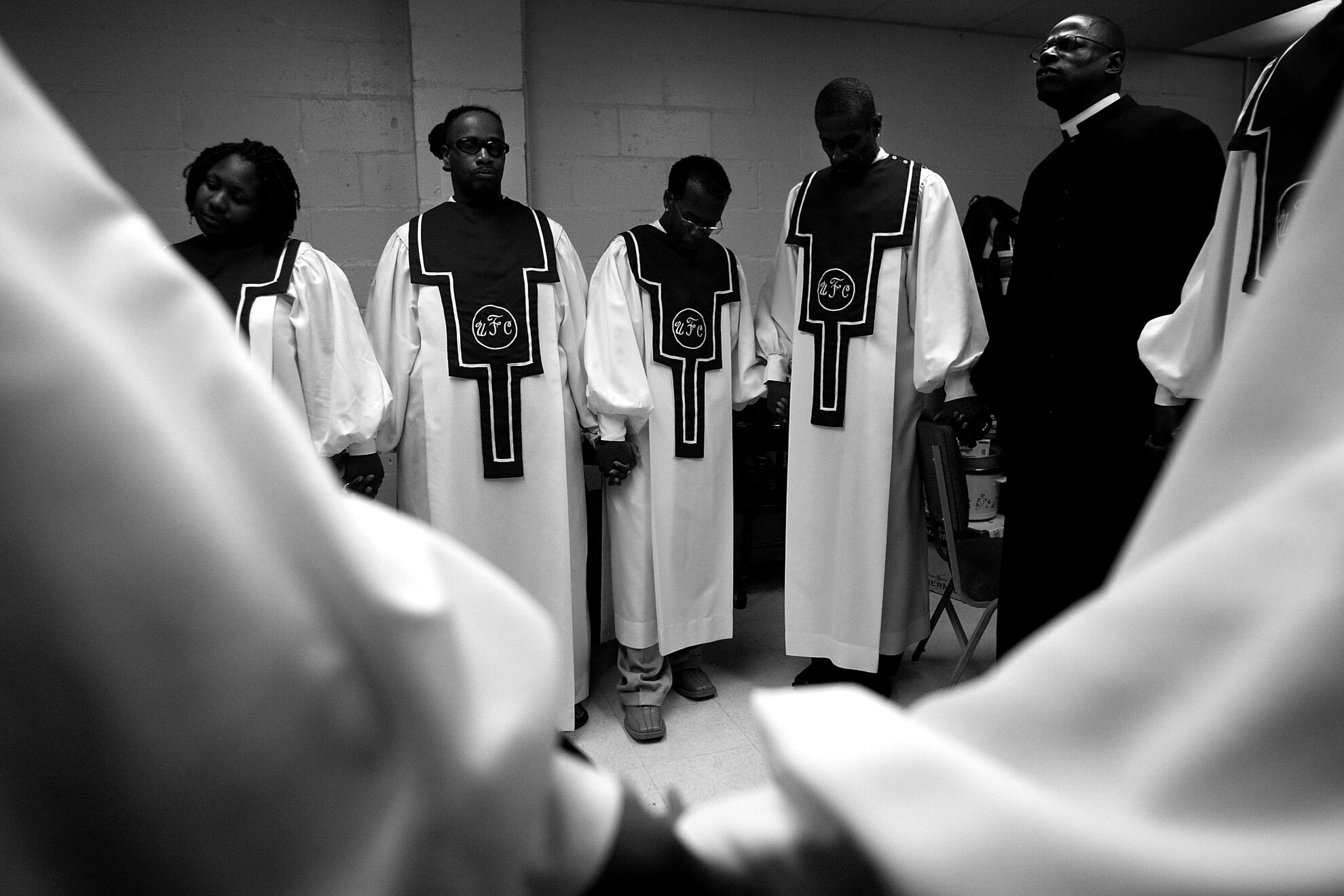  Members of the Unity Fellowship Church choir pray in their dressing room before their church service begins. UFC is a predominantly gay African- American Church in Los Angeles.   