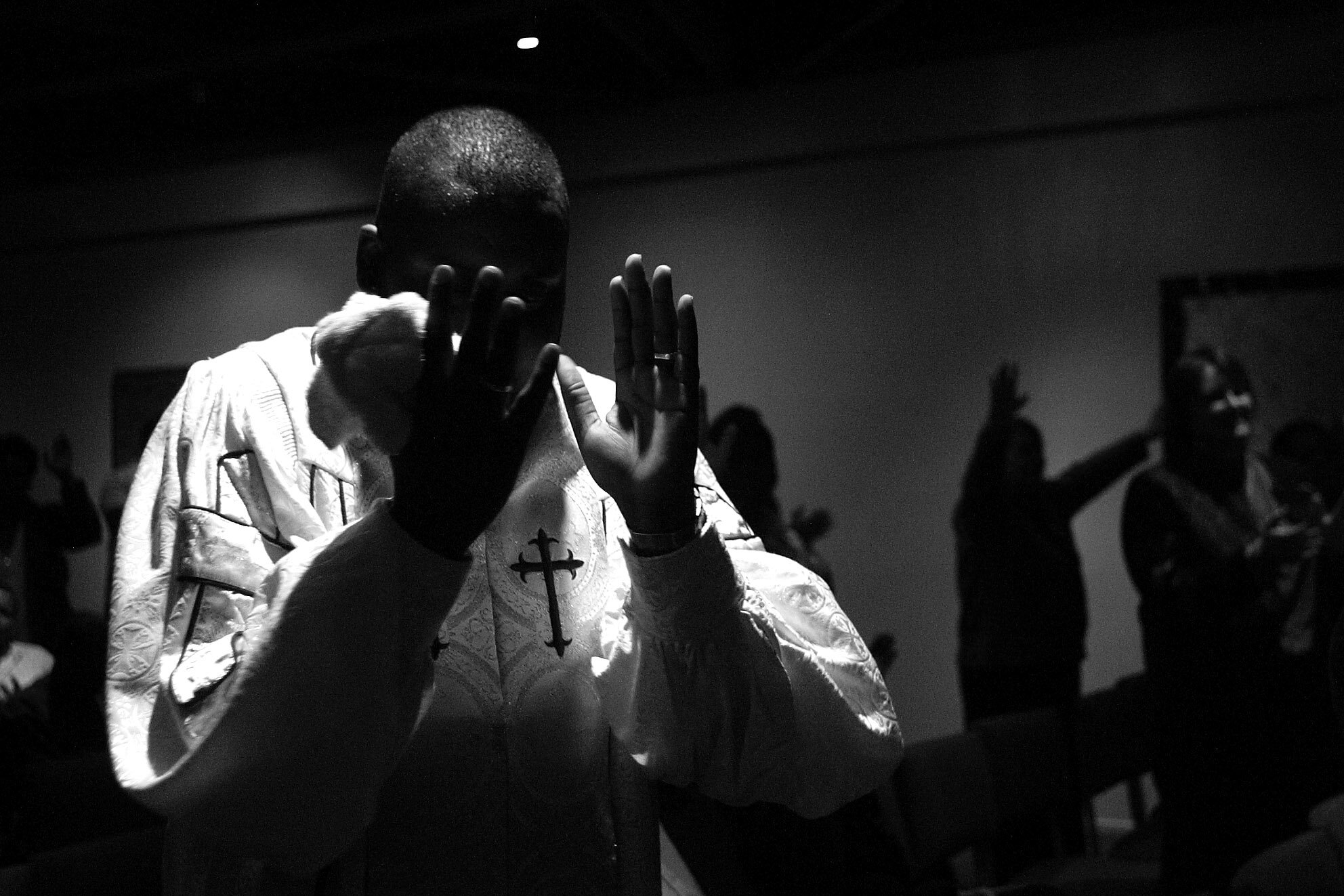  Rev. James Mills Sr. of the Greater Hope Fellowship in Philadelphia prays during the Liberating Pentacostalism celebration at Unity Fellowship Church in Los Angeles. Gay pentecostals from around the country gathered at UFC to celebrate the 100th ann