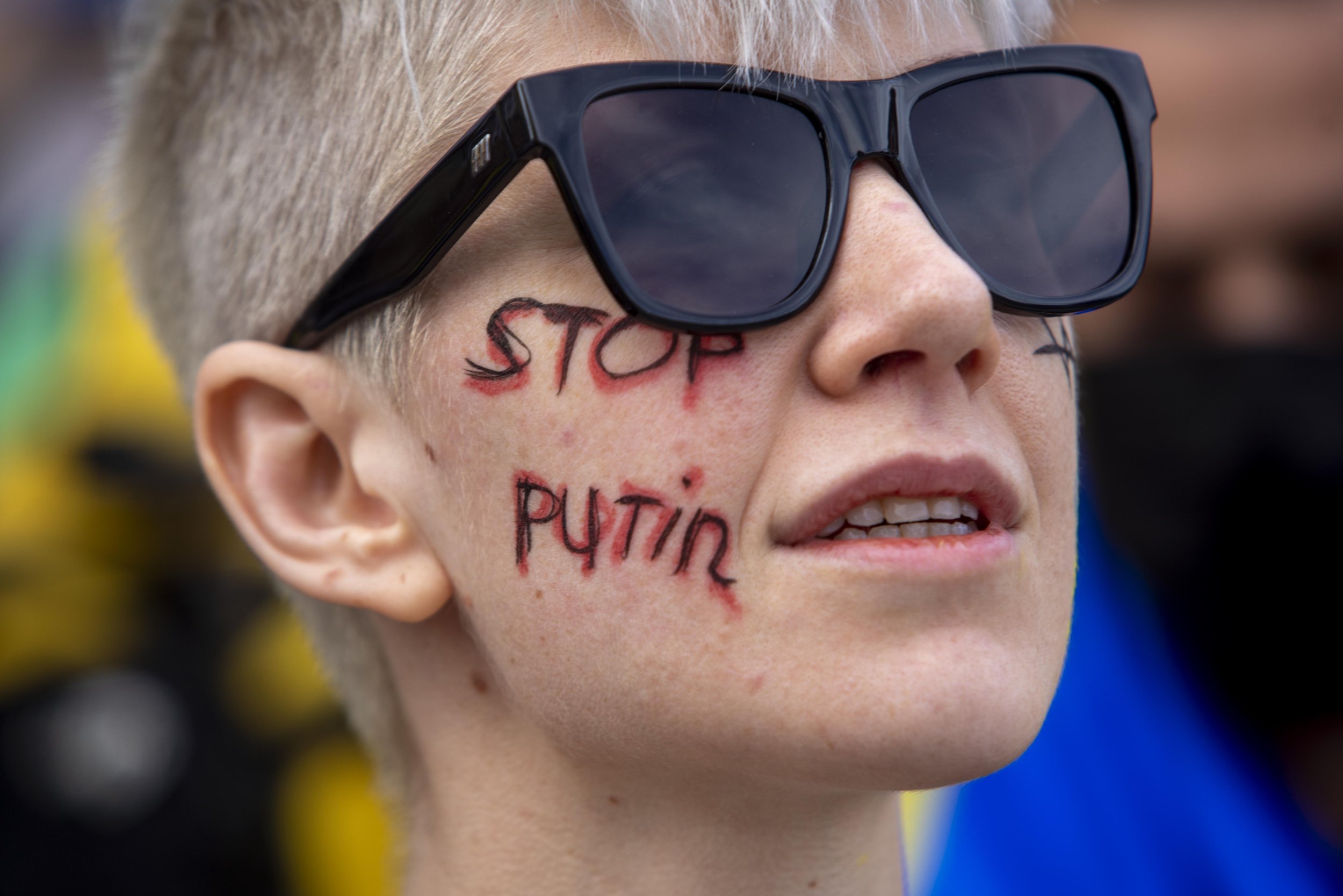  A woman, who identified herself as Russian,  has Stop Putin written on her face as she joined Ukraine supporters who gathered at the intersection of Santa Monica and Sepulveda Boulevards in  Westwood to protest against Russia's invasion of Ukraine. 