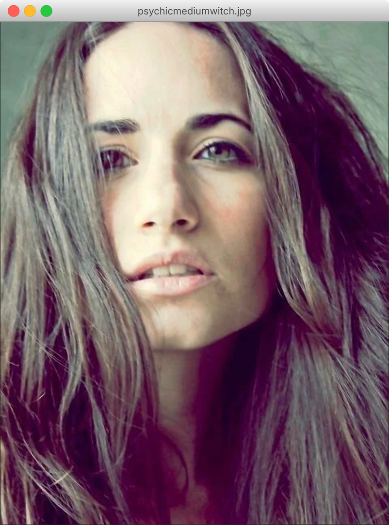Close-up portrait of Leigh Ann with long dark hair