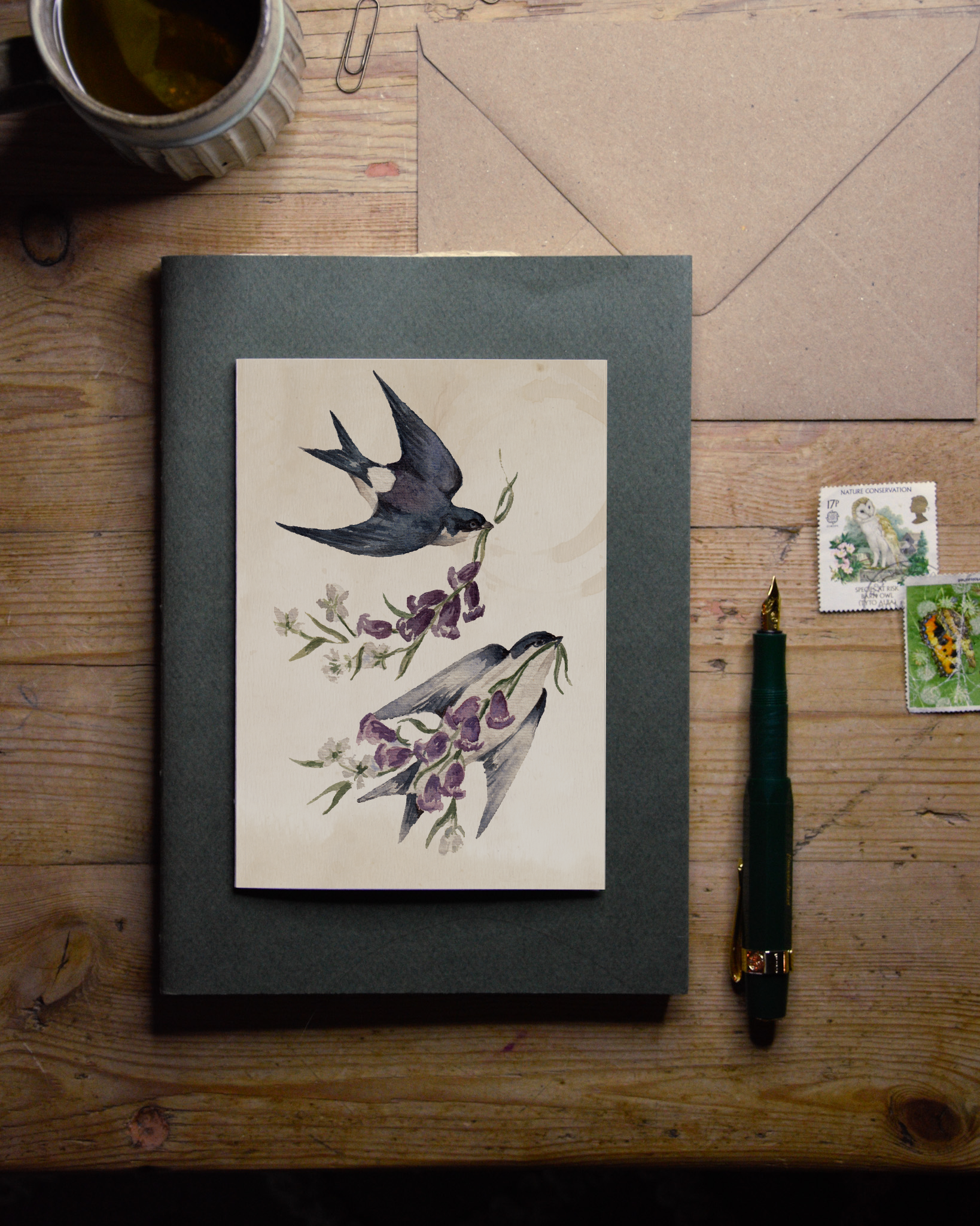 BM201 SUMMER IS HERE HOUSE MARTIN BLUEBELL GREETINGS CARD.png