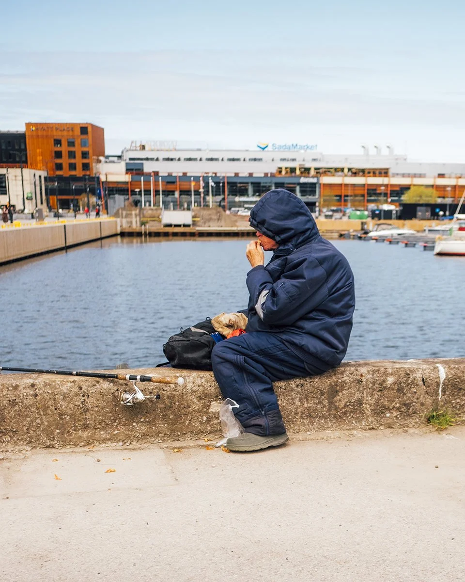 Street photography From Tallinn. Fisherman in port of Tallinn