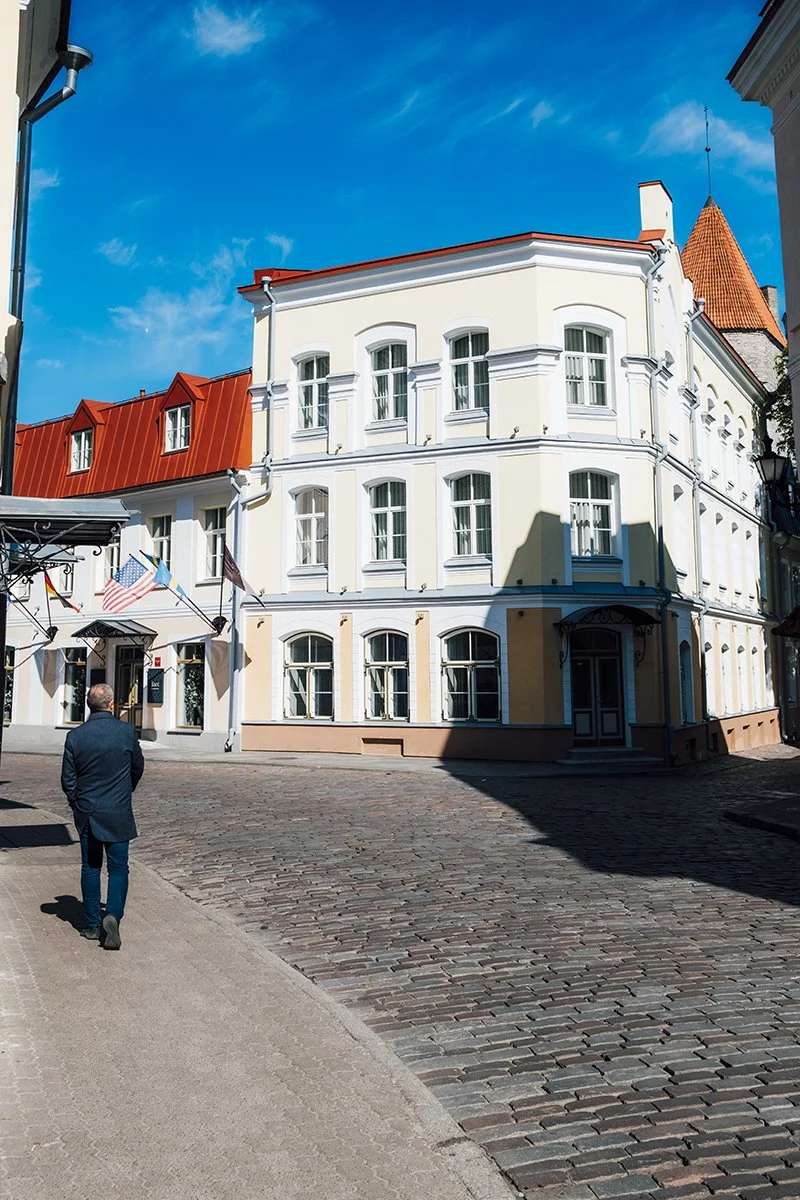 Man walking in Old Town Tallinn Estonia