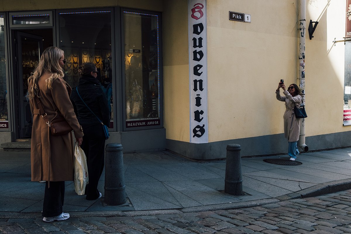 Tourist taking photo in Old Town Tallinn. Pikk 1 Tallinn