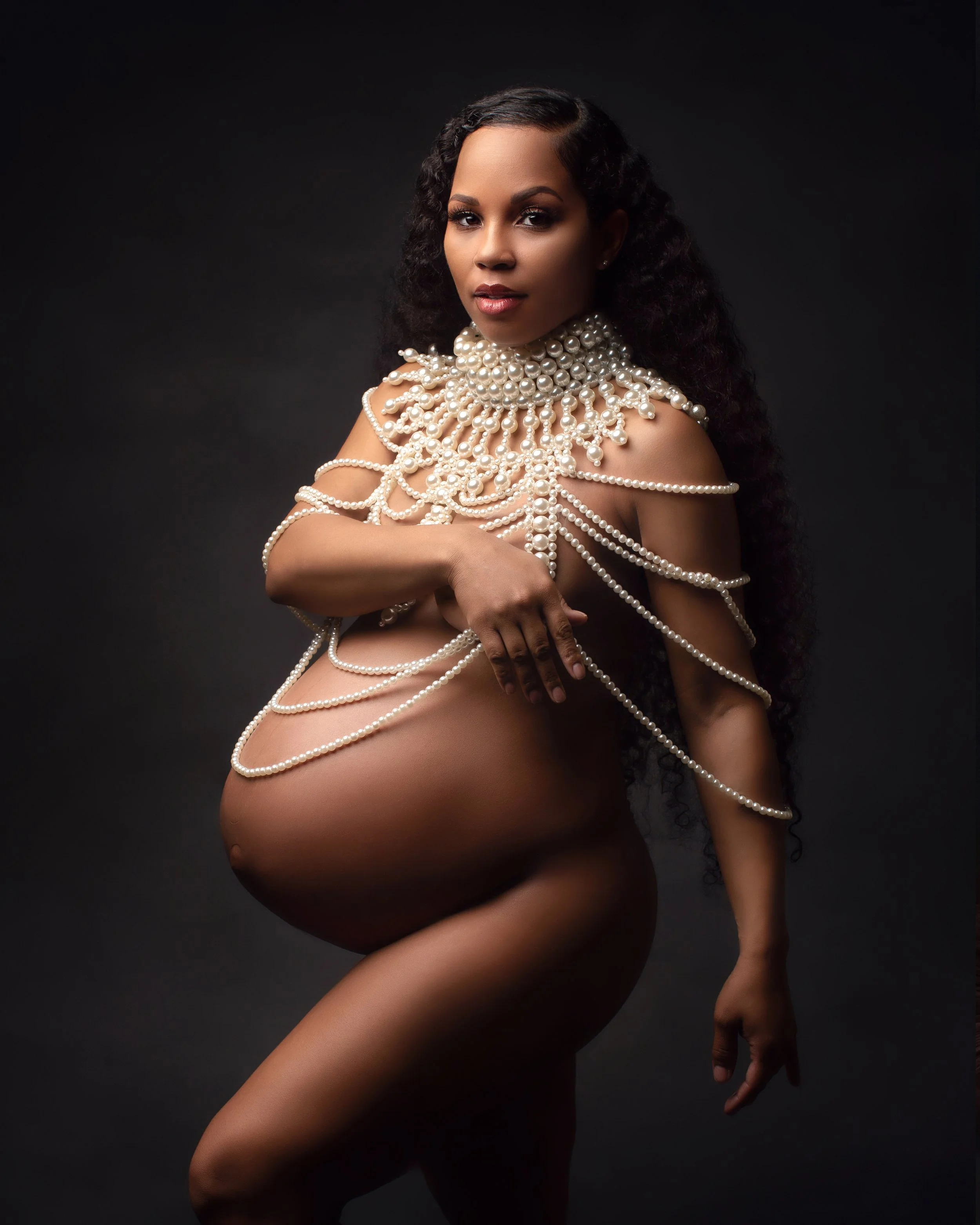 Napa and San Francisco Solano County photographer takes maternity photos of pregnant mother in beaded cape