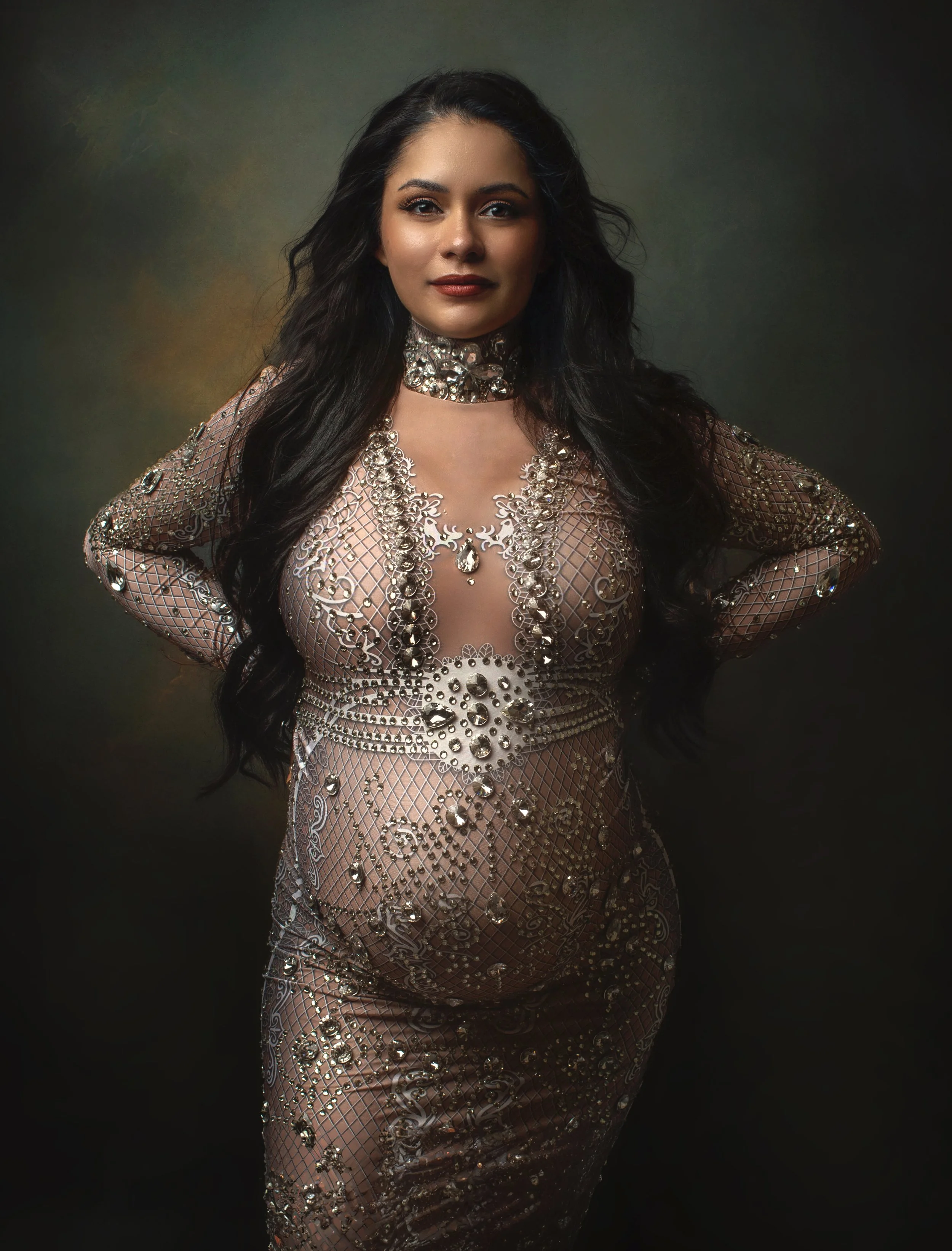 San Francisco Bay Area photographer captures timeless maternity fine art portraits of pregnant mother. Maternity studio sessions include dramatic lighting and stunning portraiture.