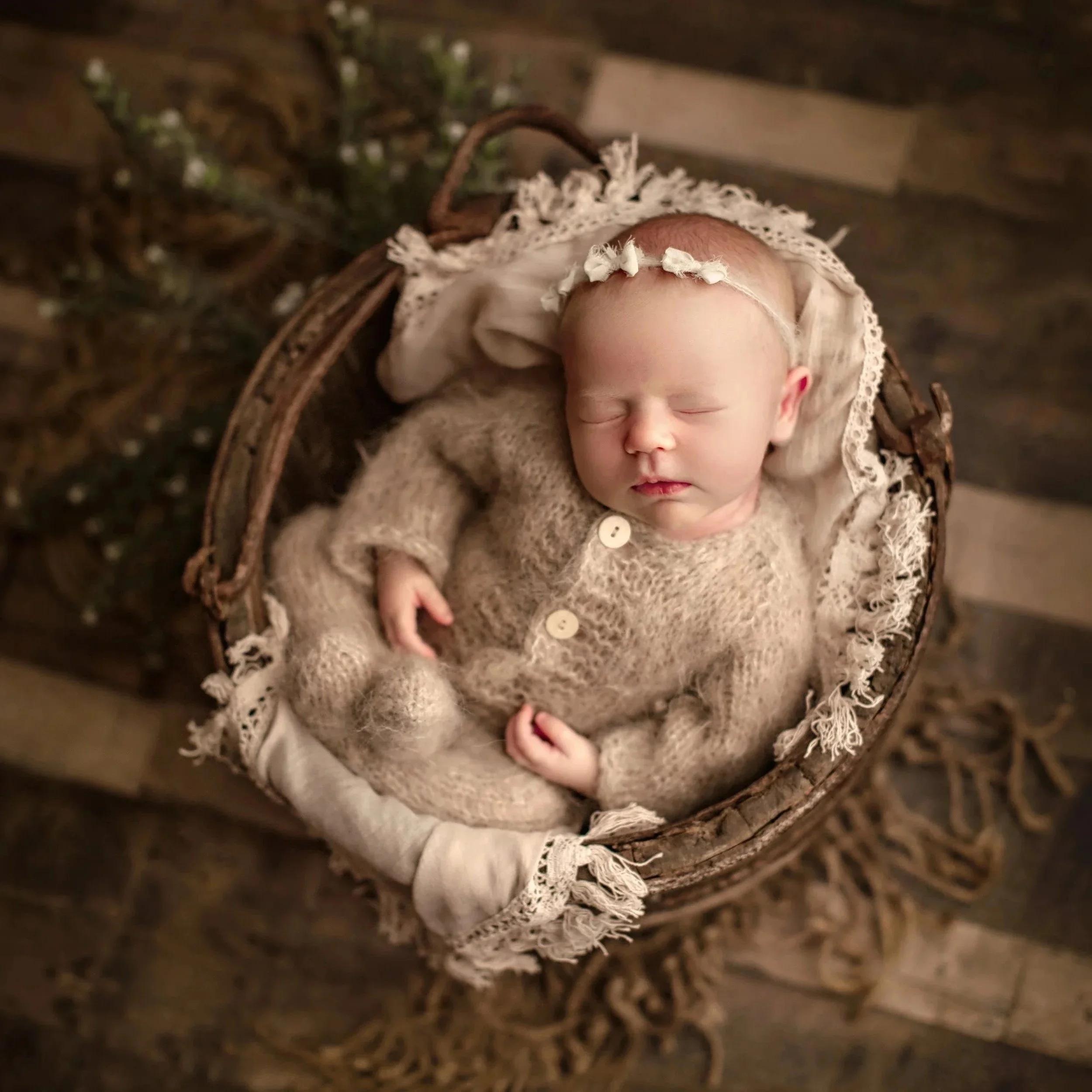 Walnut Creek and Pleasant Hill newborn photographer in the Bay Area takes photo of cute baby newborn girl in a bucket