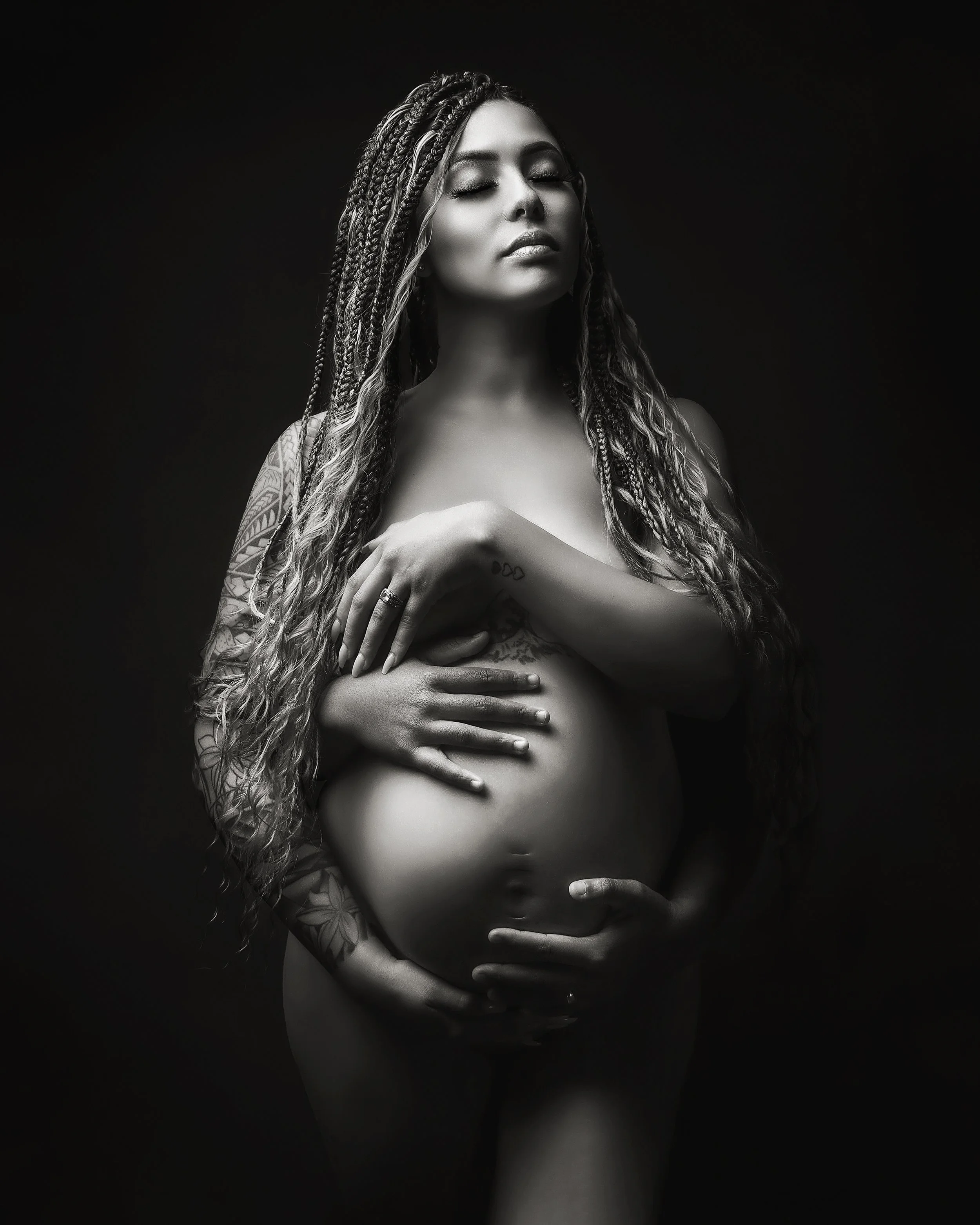 Bay Area studio maternity photoshoot highlighting baby bump and peaceful, emotional portraits. Best example of artistic Black and White Maternity Photography. 