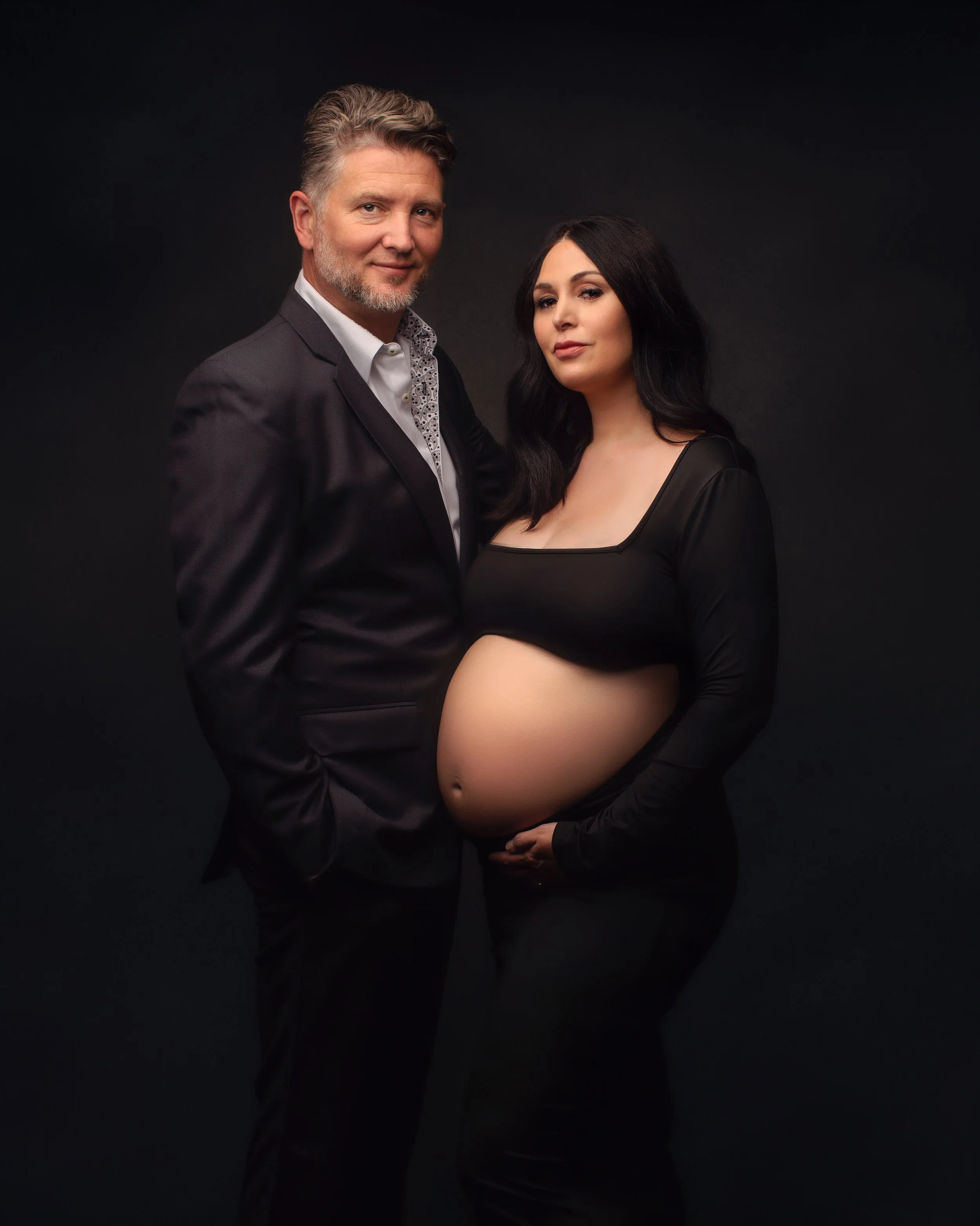 Vacaville Maternity Photographer takes portrait of couple in modern style