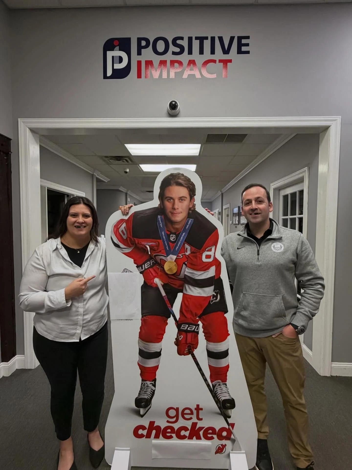 New requirement to work here: be willing to sacrifice a tooth for your team🏅#jackhughes #goldengoal #usahockey #goldmedal #jackintheoffice #makingapositiveimpact