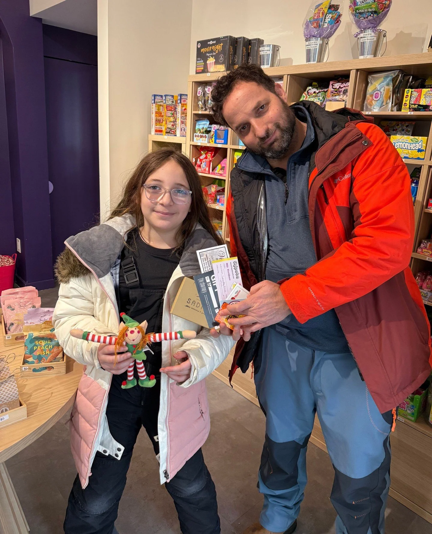 Congratulations to Ziv, our Elf Chase winner! Ziv won $250 in Downtown business gift cards, presented today at Soma Sweets 🎉⁠
⁠
A big thank you to everyone who played and to our business owners for participating and helping bring so much fun to The 