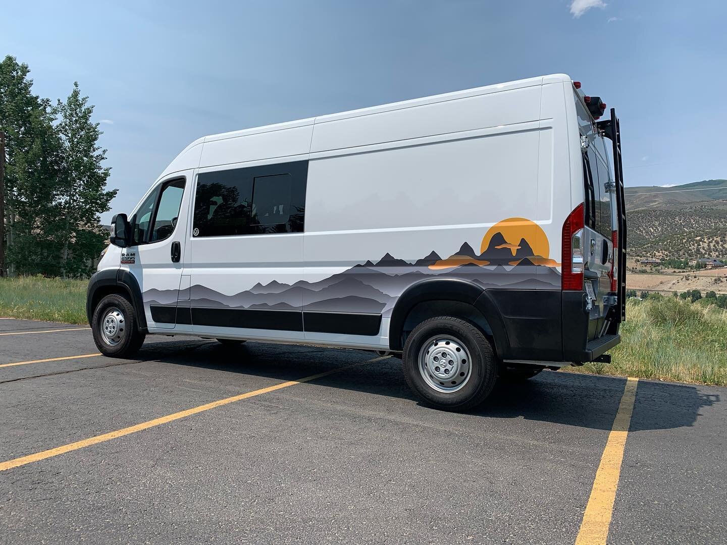 Personal camper van wrapped with mountains. We make boring white vans look more interesting.