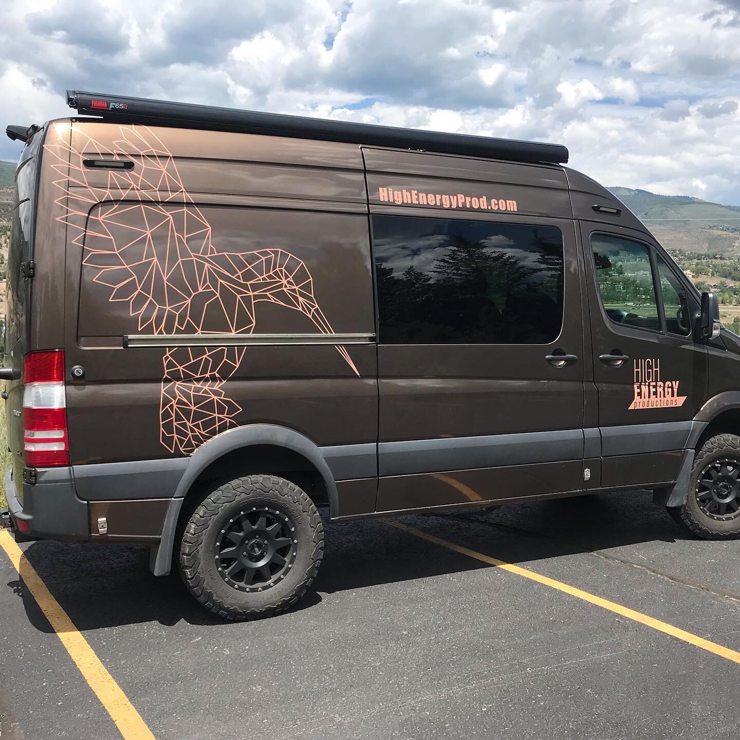 High Energy Productions needed branding for their new Sprinter van. We used a matte finish printed vinyl to achieve the subtle tone on tone look they wanted. Look for them down at the MLB Allstar events this weekend in Denver.